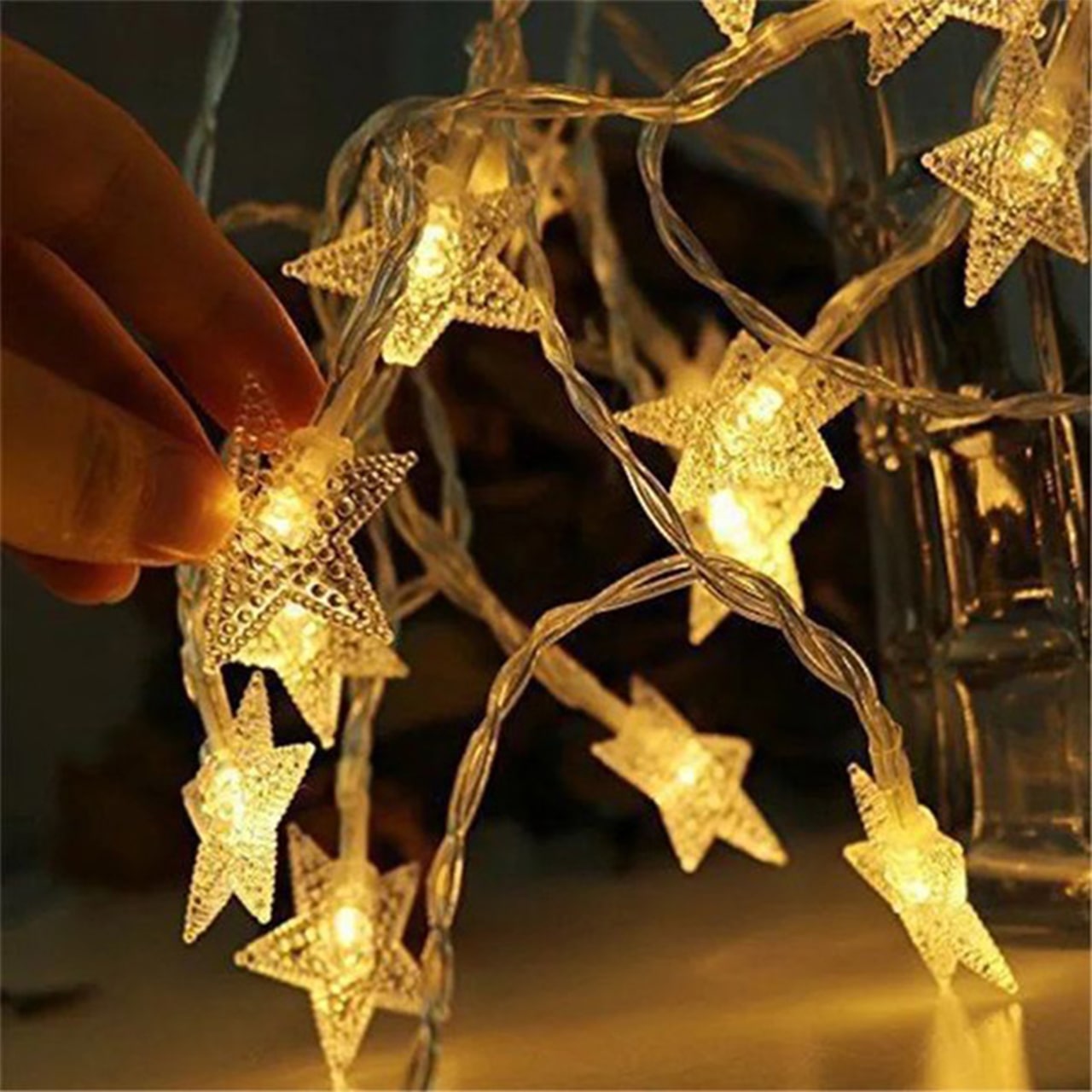 Twinkles, catena luminosa con luci a forma di stella (6 m) - Image 1